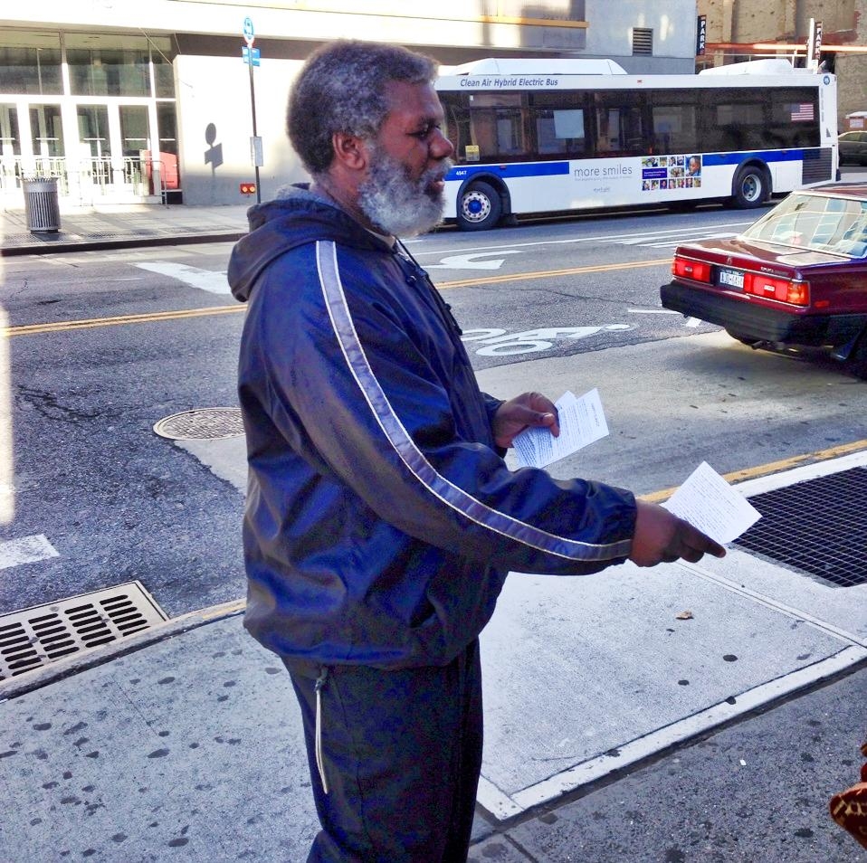 StreetPreacher giving out tracts in front of Brooklyn Tabernacle on Smith Street, Brooklyn